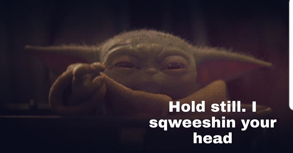 The meme is a photo of a character from the Star Wars franchise, specifically a young version of Darth Vader, with a humorous and ironic expression. The text "When you're trying to be intimidating but you're just being cute" appears below the image. The character's facial expression is one of playful innocence, rather than the menacing look that is typically associated with Darth Vader.